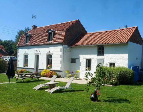 Le blason : Maisons de vacances proche de Bouvignies