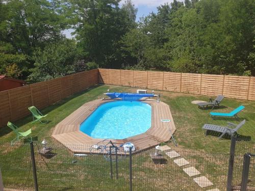 Maison familiale avec piscine : Maisons de vacances proche d'Appoigny