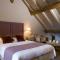 Hotels Hotel Aux Vieux Remparts, The Originals Relais : photos des chambres