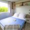 Campings Camping Country Park Touquin - Site Officiel - Next to Disneyland Paris : photos des chambres