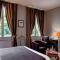 Hotels Le Pavillon De Gouffern : photos des chambres