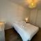 Appartements Acubens YourHostHelper : photos des chambres