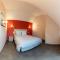 Appartements Le Moulin Rouge de CLAIRMARAIS Le Heron : photos des chambres