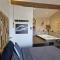 Appartements Le Lovy , Studio independant avec Jacuzzi : photos des chambres