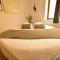 Appartements Appartement jacuzzi Gold&Night : photos des chambres