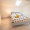 Appartements KASA SURF - Wifi TV & Cosy : photos des chambres