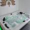 Appartements Appartement jacuzzi. : photos des chambres