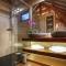 Maisons de vacances Cabane de Prestige avec Jacuzzi et Sauna privatifs : photos des chambres