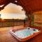 Maisons de vacances Cabane de Prestige avec Jacuzzi et Sauna privatifs : photos des chambres