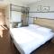 Hotels Ibis Bourgoin Jallieu Medipole : photos des chambres