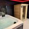 Appartements Suite romantique avec jacuzzi et sauna : photos des chambres