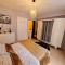 Appartements Bel appartement « Les Monts du Cantal » : photos des chambres