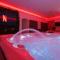 Appartements CASA AMOR & SPA, suite jacuzzi & petit dejeuner : photos des chambres