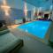 Villas Maison 2 piscines int/ext, spa : photos des chambres