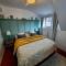 Appartements Maison Romantique/Jacuzzi : photos des chambres