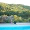 Appartements Gites de Neyrac, appartement Rose - piscine, riviere a 100 m, vue sur les collines : photos des chambres