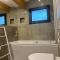 Appartements Chalet moderne & Jacuzzi privatif a proximite de Gerardmer : photos des chambres