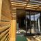 Appartements Bienvenue a la Wooden House ! : photos des chambres