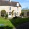 Maisons de vacances L'auberge du lavoir, maison en pierres avec jardin : photos des chambres