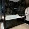 Appartements * Love Room jacuzzi * : photos des chambres