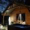 Lodges L ost in Sensations -Hebergements Insolites et Suites de luxe Spa Sauna Piscine Foret : photos des chambres