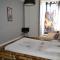B&B / Chambres d'hotes Grande chambre avec lit Bambou et canape lit : photos des chambres