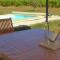 Maisons de vacances Cosy holiday home with swimming pool : photos des chambres